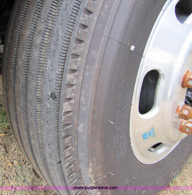 image for item 8002 2002 Freightliner Conventional FLD120 semi truck