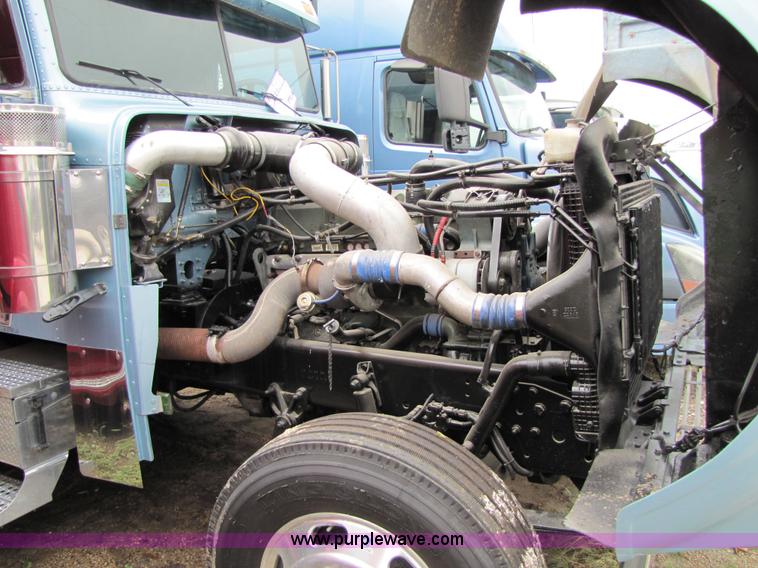 image for item 8002 2002 Freightliner Conventional FLD120 semi truck