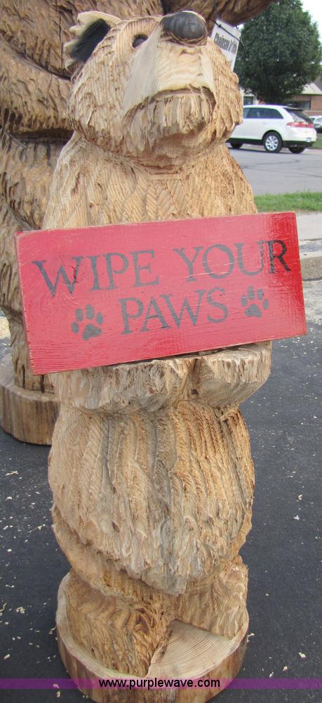 image for item 1004 Bear holding a "Wipe Your Paws" sign chainsaw art carving