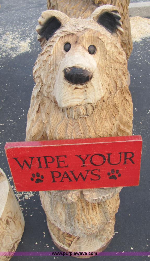 image for item 1004 Bear holding a "Wipe Your Paws" sign chainsaw art carving
