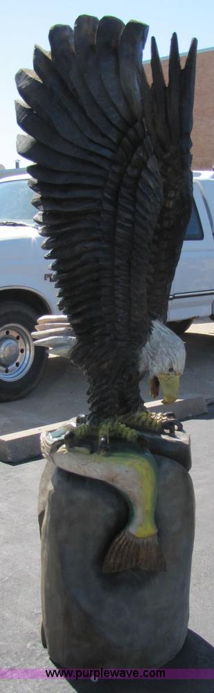 image for item 7182 Bald Eagle with fish chainsaw art carving