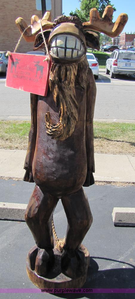image for item 7188 Moose with "Welcome to Our Neck of the Woods" sign chainsaw art carving
