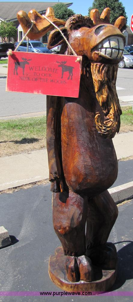 image for item 7188 Moose with "Welcome to Our Neck of the Woods" sign chainsaw art carving