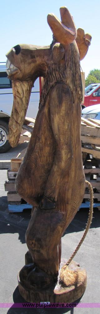 image for item 7188 Moose with "Welcome to Our Neck of the Woods" sign chainsaw art carving