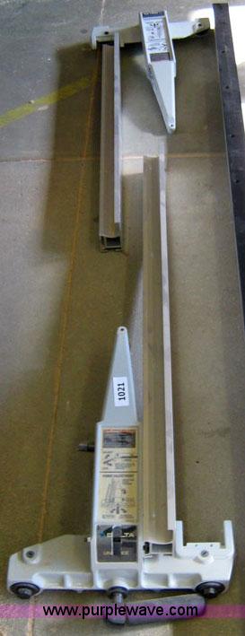 image for item 1021 (2) Delta tablesaw fences and 82" tablesaw rail