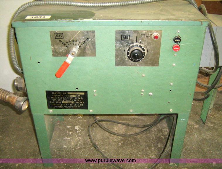 image for item 1031 Foundry and forge with cabinet containing assorted tools, gloves, and crucibles