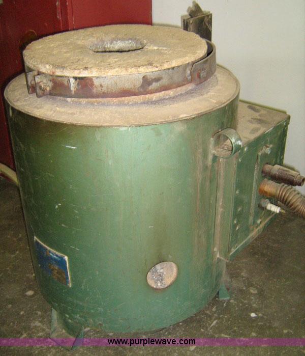 image for item 1031 Foundry and forge with cabinet containing assorted tools, gloves, and crucibles