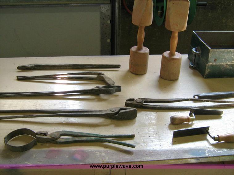 image for item 1031 Foundry and forge with cabinet containing assorted tools, gloves, and crucibles