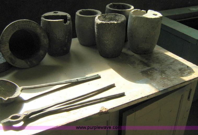 image for item 1031 Foundry and forge with cabinet containing assorted tools, gloves, and crucibles