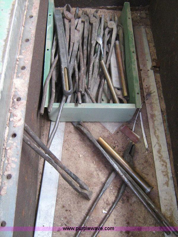 image for item 1031 Foundry and forge with cabinet containing assorted tools, gloves, and crucibles