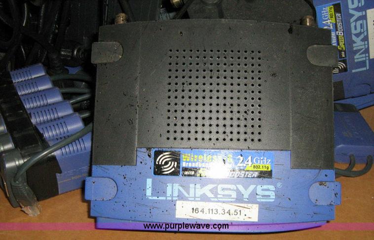 image for item 1045 Assorted Linksys WTR54GS and POE injectors