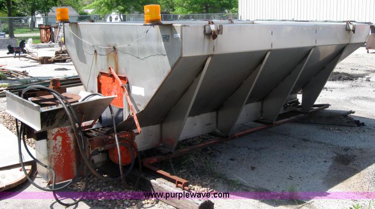 image for item 2206 Fink stainless steel self feeding spreader