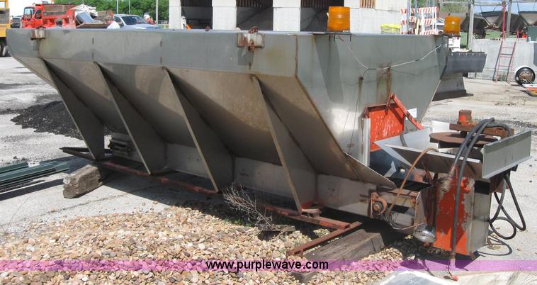 image for item 2206 Fink stainless steel self feeding spreader