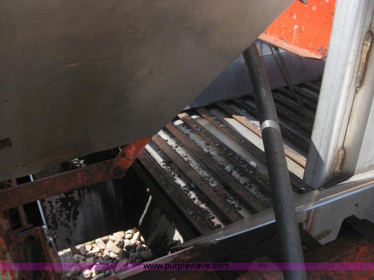 image for item 2206 Fink stainless steel self feeding spreader