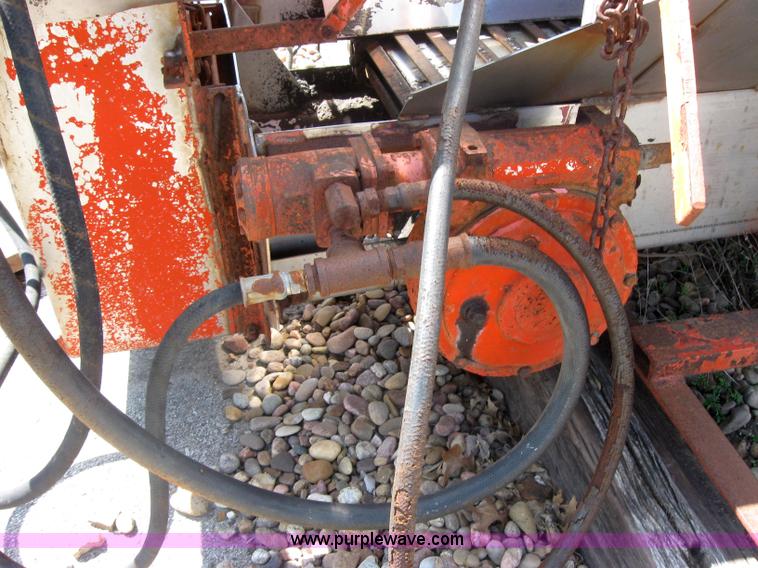 image for item 2206 Fink stainless steel self feeding spreader