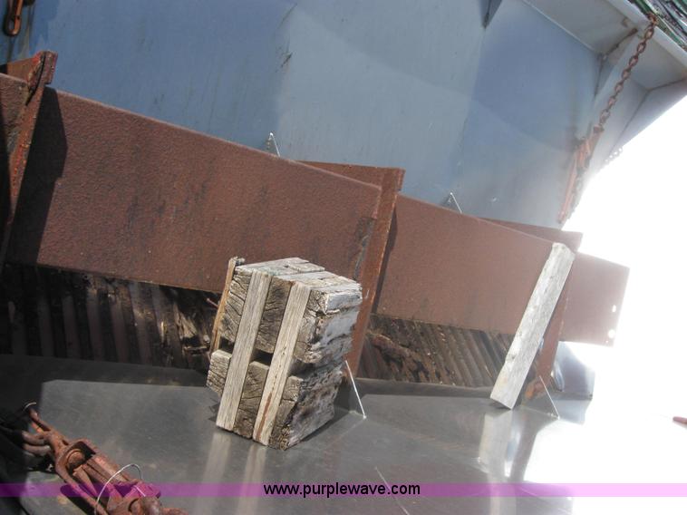 image for item 2206 Fink stainless steel self feeding spreader