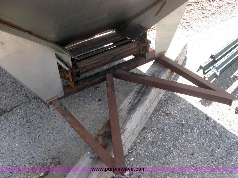 image for item 2206 Fink stainless steel self feeding spreader