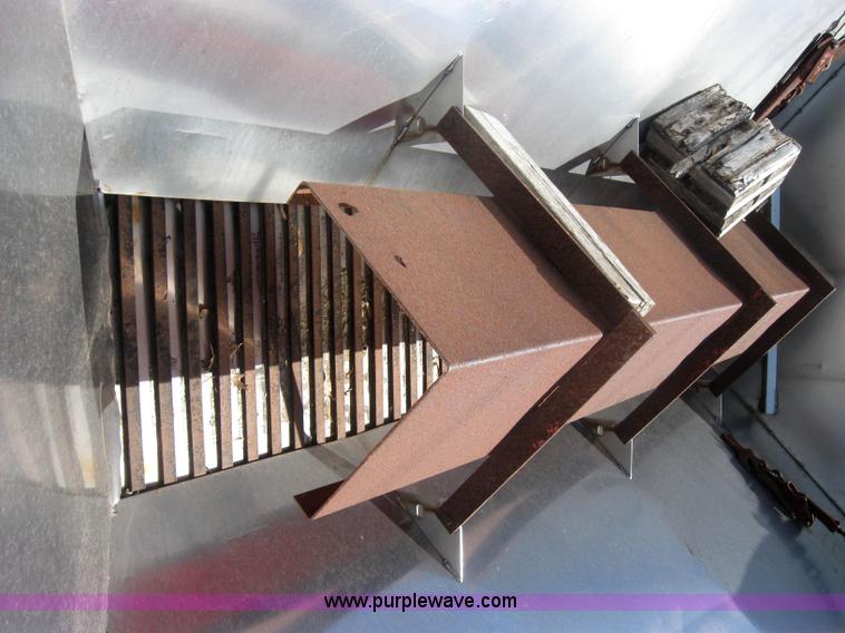 image for item 2206 Fink stainless steel self feeding spreader