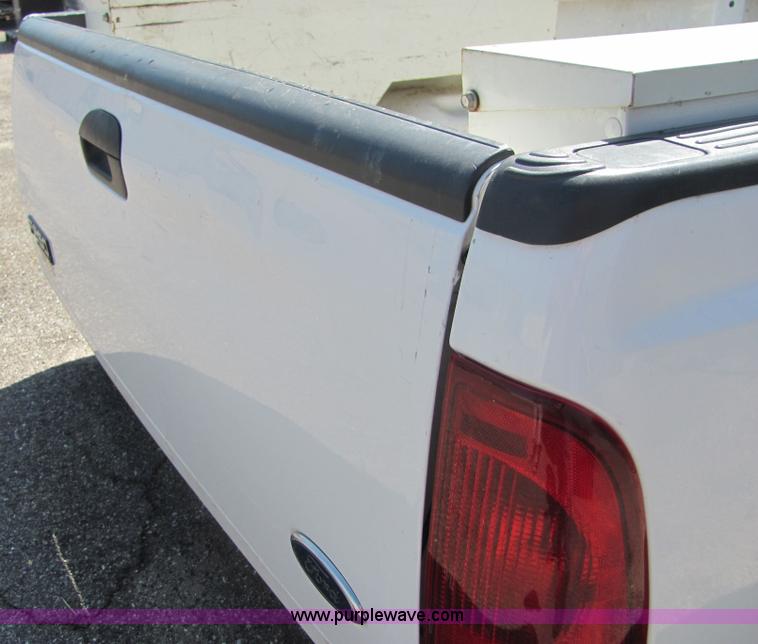 image for item 4656 2000 Ford F250 8' pickup bed with bumper and Delta tool box