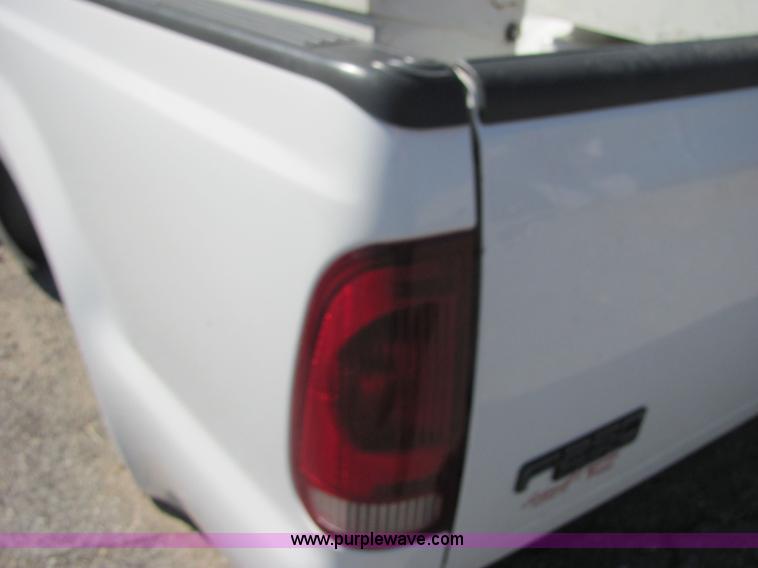 image for item 4656 2000 Ford F250 8' pickup bed with bumper and Delta tool box