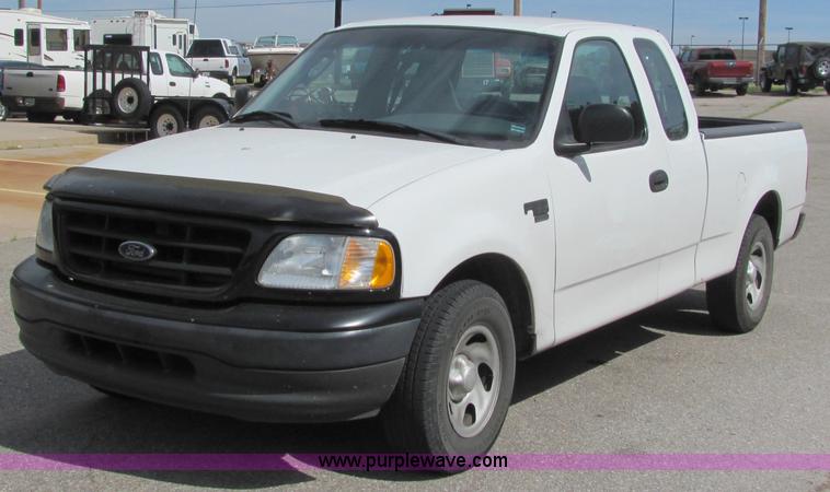 image for item 6484 2002 Ford F150 XL extended cab pickup truck