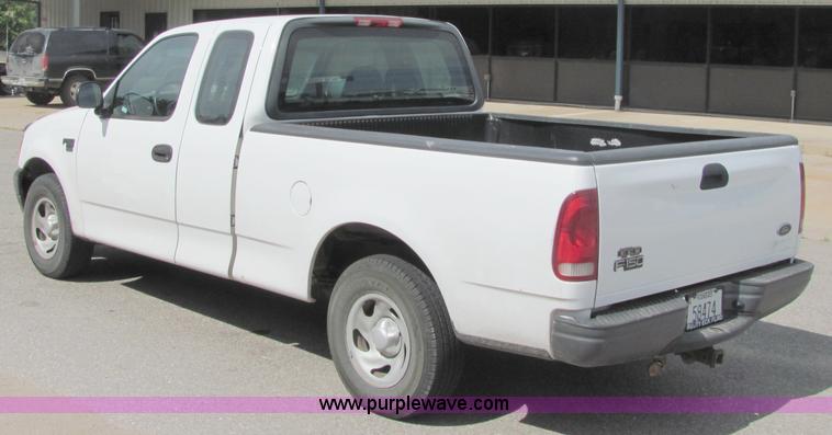 image for item 6484 2002 Ford F150 XL extended cab pickup truck