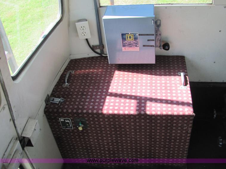 image for item 6499 1974 Ford 44 passenger bus