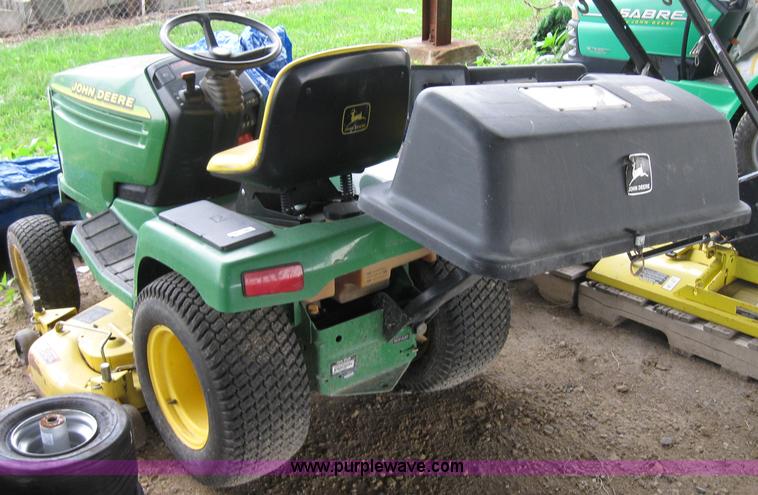 image for item 2127 John Deere 325 lawn mower