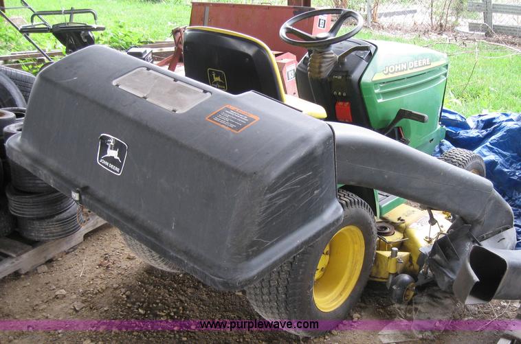 image for item 2127 John Deere 325 lawn mower