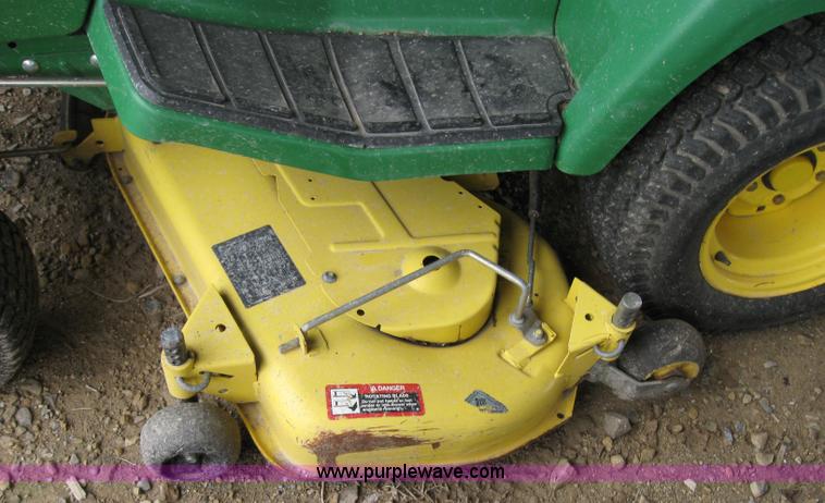 image for item 2127 John Deere 325 lawn mower