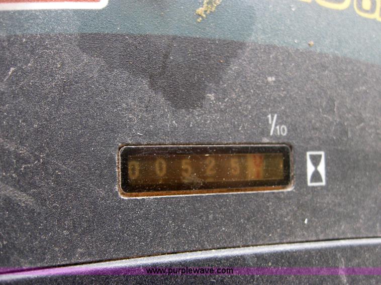 image for item 2127 John Deere 325 lawn mower