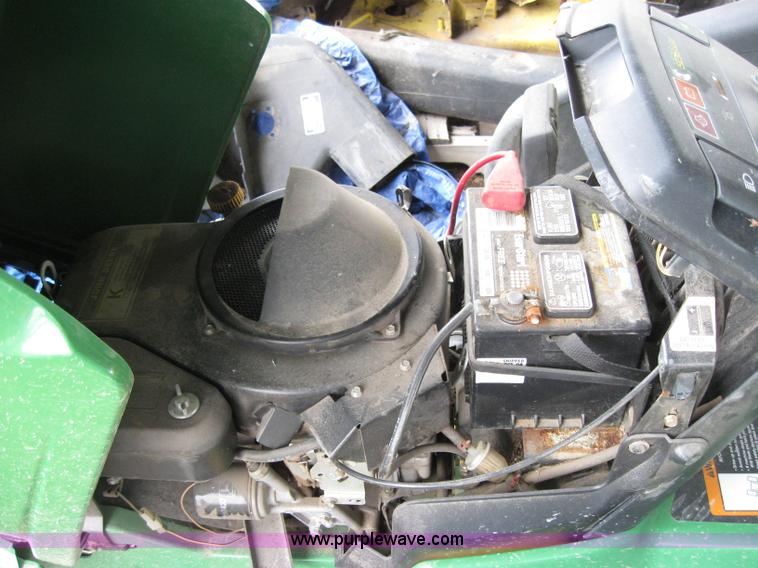 image for item 2127 John Deere 325 lawn mower