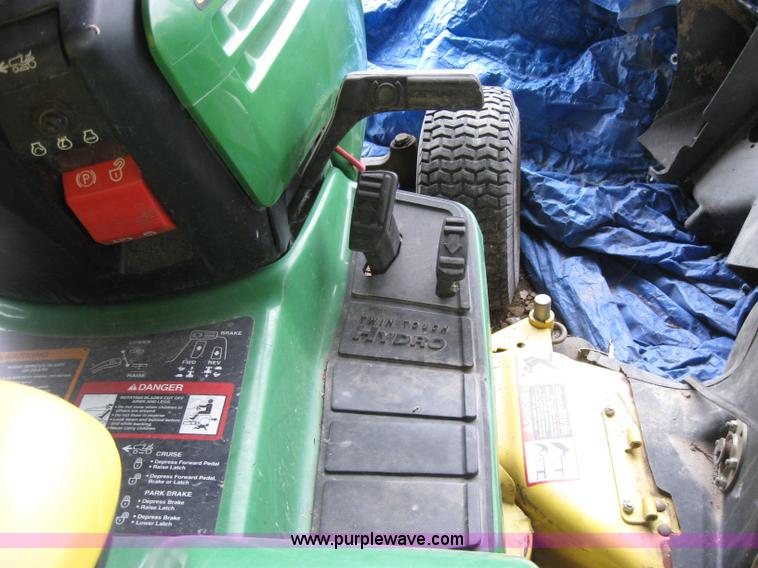image for item 2127 John Deere 325 lawn mower