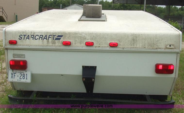 image for item 7029 Starcraft Starflyer pop up pull behind camper