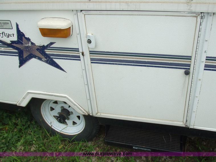 image for item 7033 Starcraft Starflyer pop-up pull behind camper