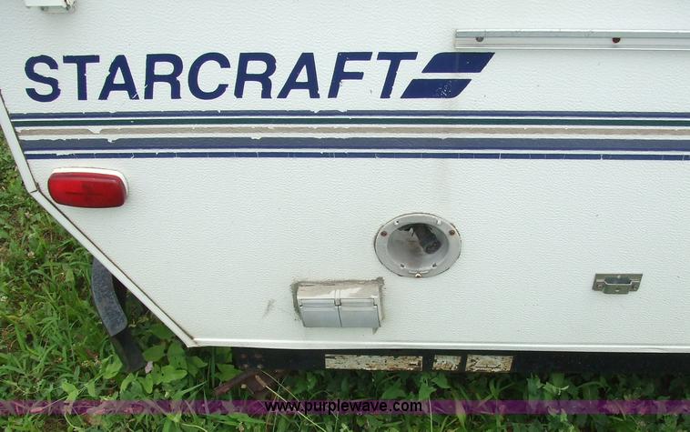 image for item 7033 Starcraft Starflyer pop-up pull behind camper