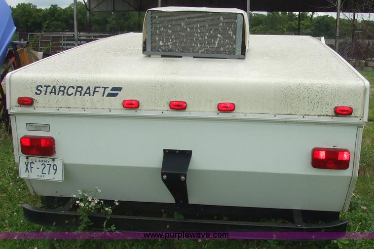image for item 7033 Starcraft Starflyer pop-up pull behind camper