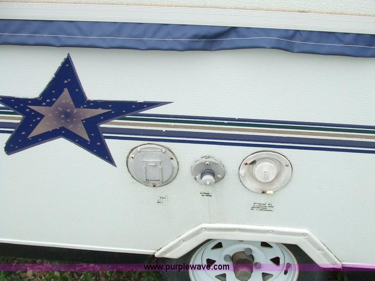 image for item 7033 Starcraft Starflyer pop-up pull behind camper