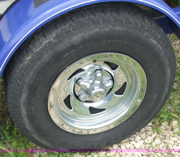 image for item 7048 Tahoe Q4 18' boat with trailer