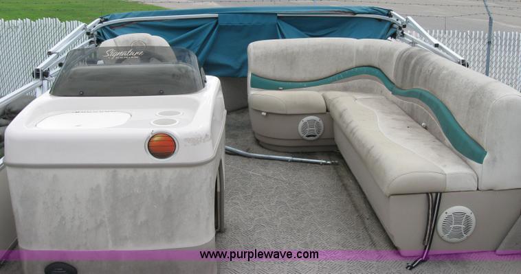 image for item 7049 Sun Tracker 18' bass buggy pontoon boat with trailer