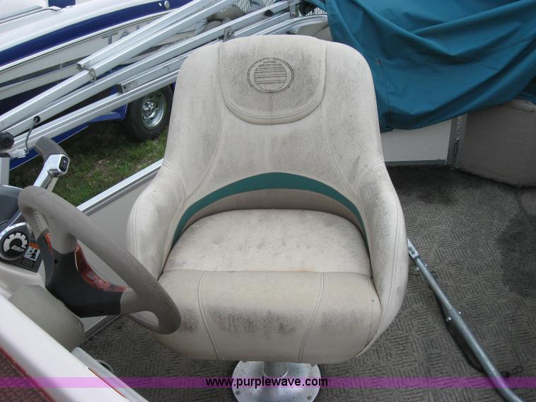 image for item 7049 Sun Tracker 18' bass buggy pontoon boat with trailer