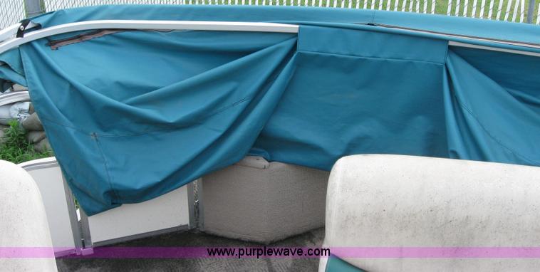 image for item 7049 Sun Tracker 18' bass buggy pontoon boat with trailer