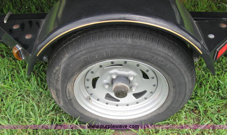 image for item 7049 Sun Tracker 18' bass buggy pontoon boat with trailer