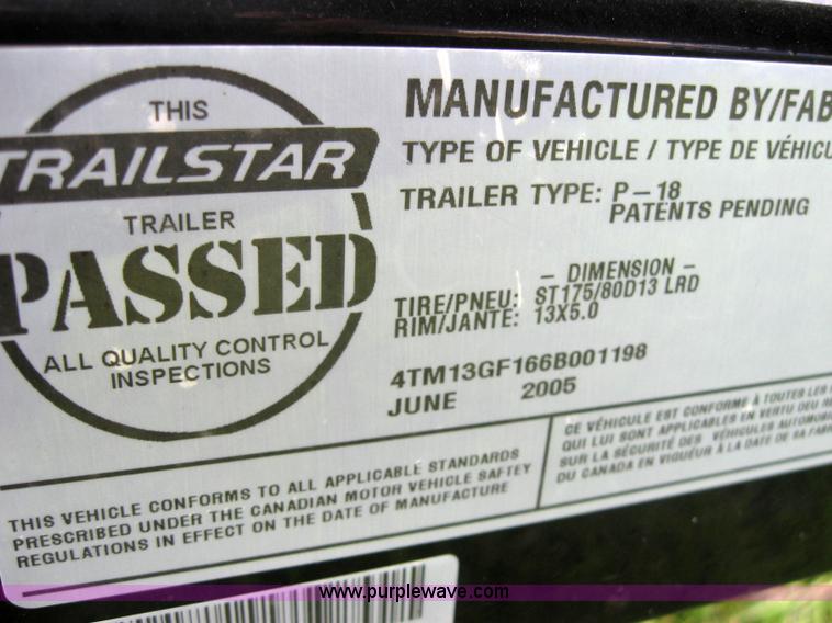 image for item 7049 Sun Tracker 18' bass buggy pontoon boat with trailer