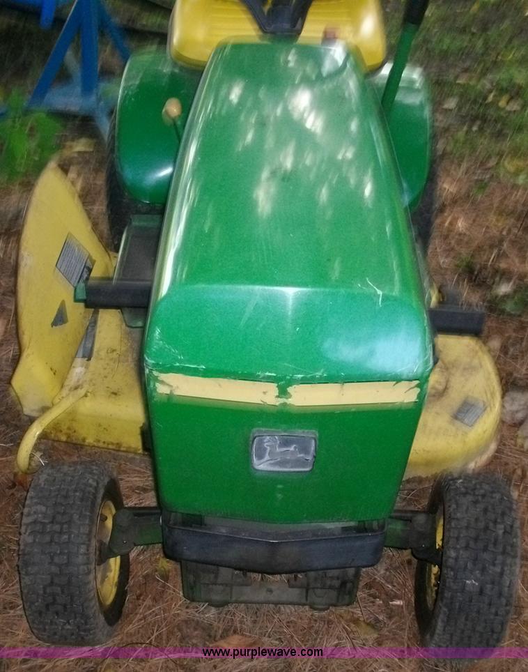 image for item 1012 John Deere 100 lawn mower