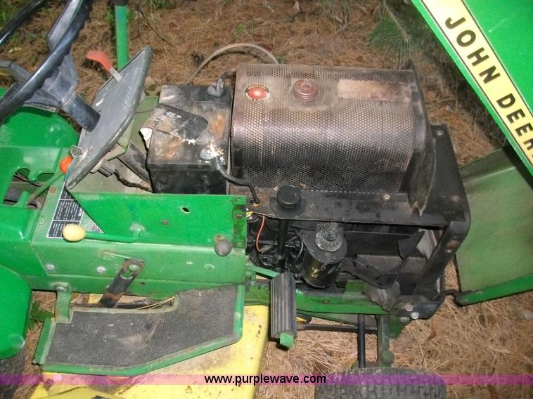 image for item 1012 John Deere 100 lawn mower