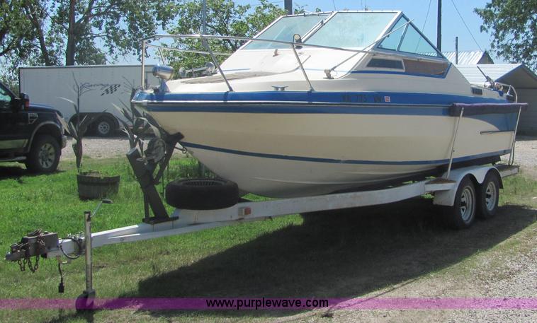image for item 4616 1976 Glastron 25' cabin cruiser boat with trailer