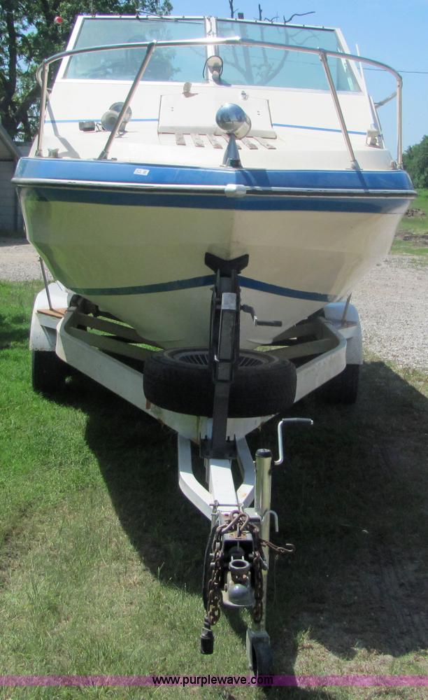 image for item 4616 1976 Glastron 25' cabin cruiser boat with trailer