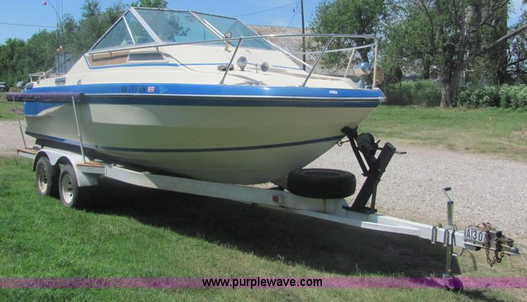 image for item 4616 1976 Glastron 25' cabin cruiser boat with trailer