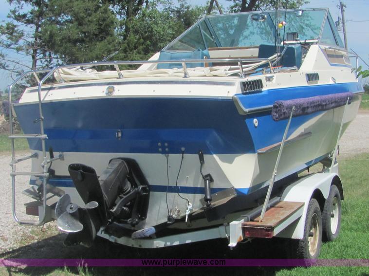 image for item 4616 1976 Glastron 25' cabin cruiser boat with trailer